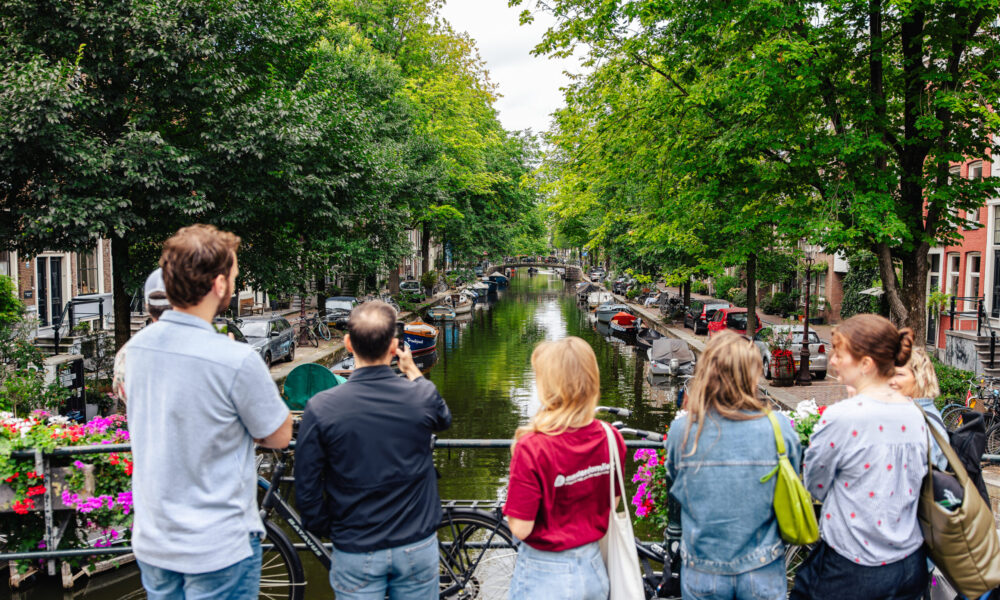 Group of tourists on a bridge in Amsterdam