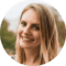 Portrait of a smiling blonde woman. Amsterdam city trips.
