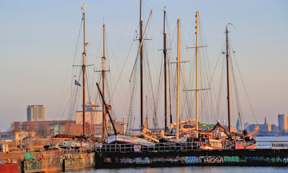 Sailing ships docked in Amsterdam harbour.